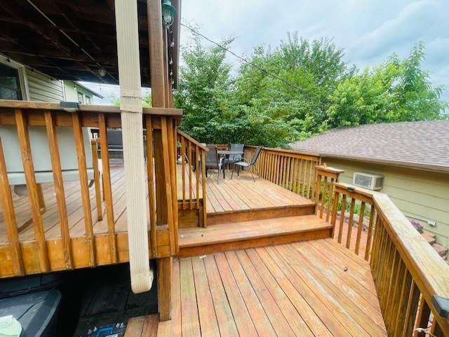 3119 Seneca St, Saint Joseph, MO 64507 - wooden terrace with outdoor dining area