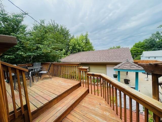 3119 Seneca St, Saint Joseph, MO 64507 - deck featuring outdoor dining area