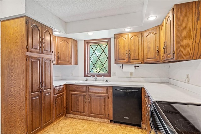 4445 NW 52nd Ter, Topeka, KS 66618 - kitchen featuring dishwasher, a textured ceiling, light countertops, brown cabinets, and recessed lighting