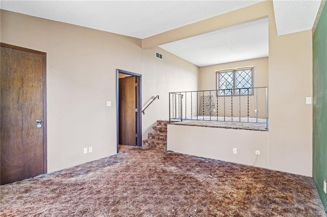 4445 NW 52nd Ter, Topeka, KS 66618 - carpeted spare room with stairway