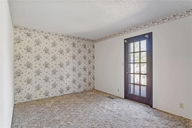 4445 NW 52nd Ter, Topeka, KS 66618 - carpeted empty room featuring a textured ceiling
