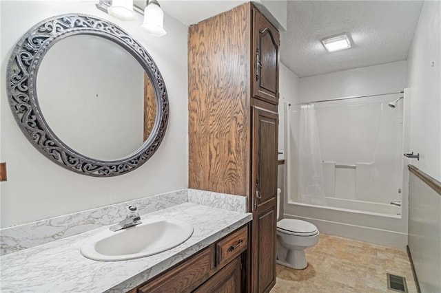 4445 NW 52nd Ter, Topeka, KS 66618 - full bath with vanity, a textured ceiling, and shower / tub combo