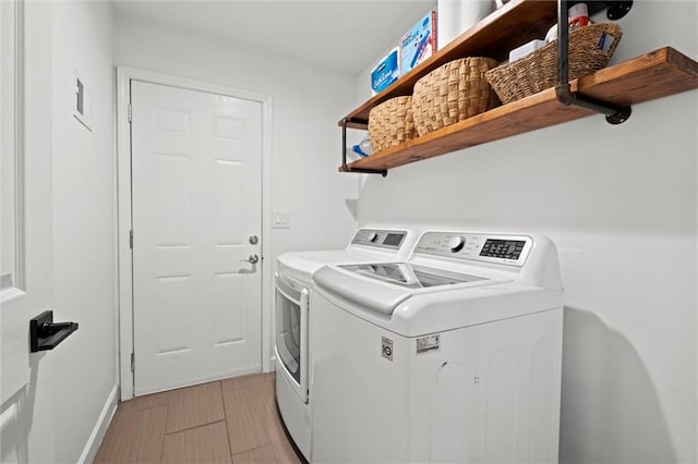 12005 W 100th Ter, Lenexa, KS 66215 - washroom with washer and dryer and baseboards