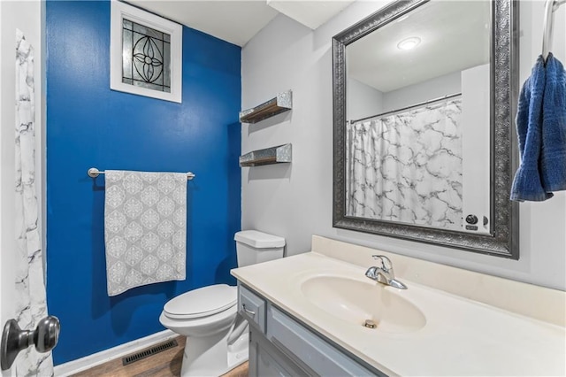 1275 NE Tudor Rd, Lees Summit, MO 64086 - full bath featuring vanity and wood finished floors