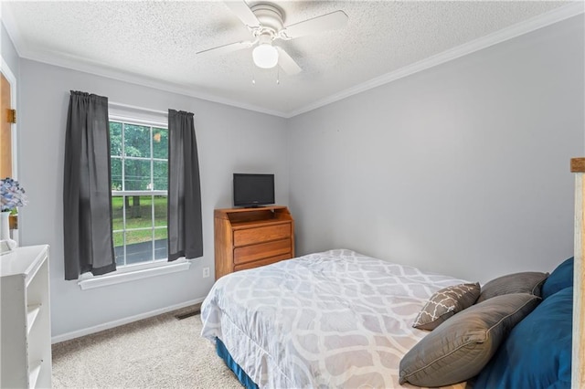 1275 NE Tudor Rd, Lees Summit, MO 64086 - carpeted bedroom featuring a textured ceiling, ornamental molding, and a ceiling fan