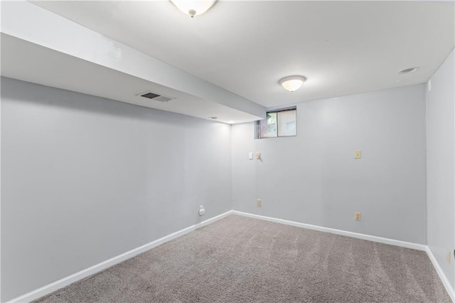 1275 NE Tudor Rd, Lees Summit, MO 64086 - below grade area with carpet floors and baseboards