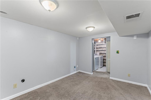 1275 NE Tudor Rd, Lees Summit, MO 64086 - empty room featuring washer / dryer and carpet flooring