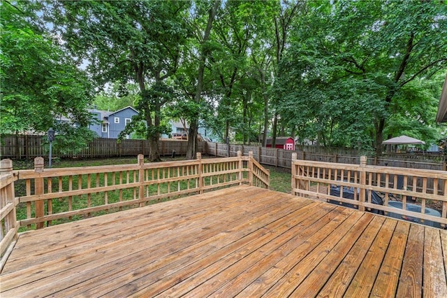 1275 NE Tudor Rd, Lees Summit, MO 64086 - wooden deck with a fenced backyard