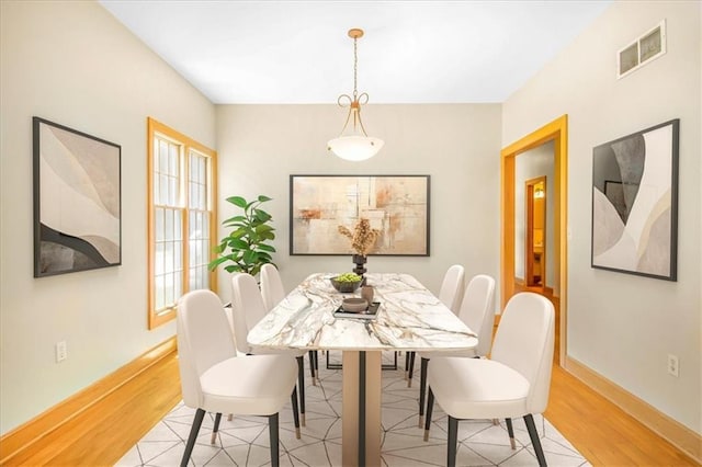 245 SW 400th Rd, Warrensburg, MO 64093 - dining space featuring light wood-style flooring