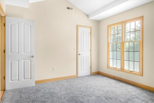 245 SW 400th Rd, Warrensburg, MO 64093 - unfurnished bedroom with carpet floors and lofted ceiling