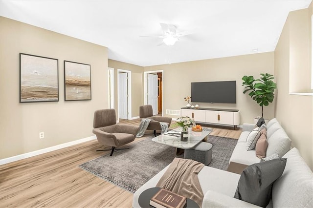 245 SW 400th Rd, Warrensburg, MO 64093 - living room with wood finished floors and a ceiling fan