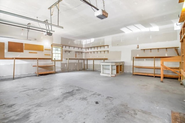 245 SW 400th Rd, Warrensburg, MO 64093 - garage featuring a garage door opener