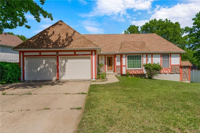 12417 Newton Ct, Grandview, MO 64030 - view of front of property featuring an attached garage, driveway, a front yard, roof with shingles, and stone siding