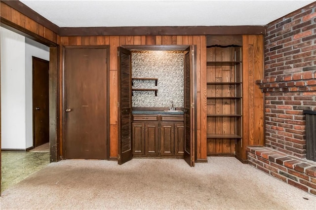 12417 Newton Ct, Grandview, MO 64030 - interior space featuring carpet floors and wood walls