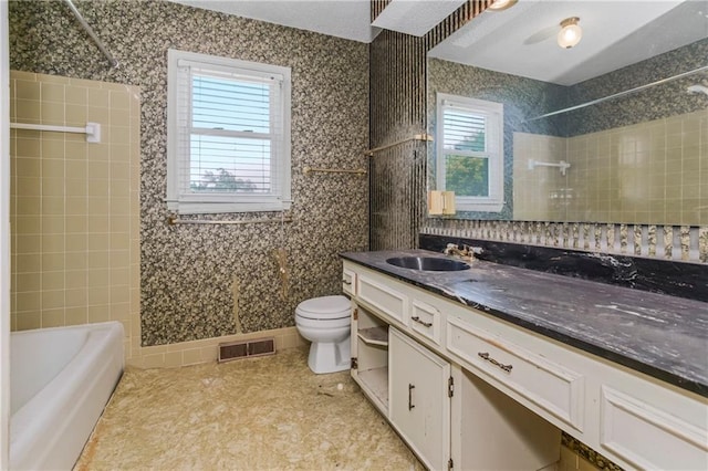 12417 Newton Ct, Grandview, MO 64030 - full bath featuring tub / shower combination and vanity