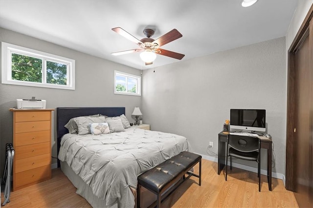 6628 Bradshaw St, Shawnee, KS 66216 - bedroom with light wood-type flooring and a ceiling fan