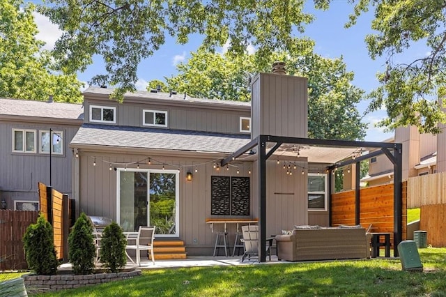 6628 Bradshaw St, Shawnee, KS 66216 - back of house with a chimney, roof with shingles, a patio, entry steps, and an outdoor hangout area
