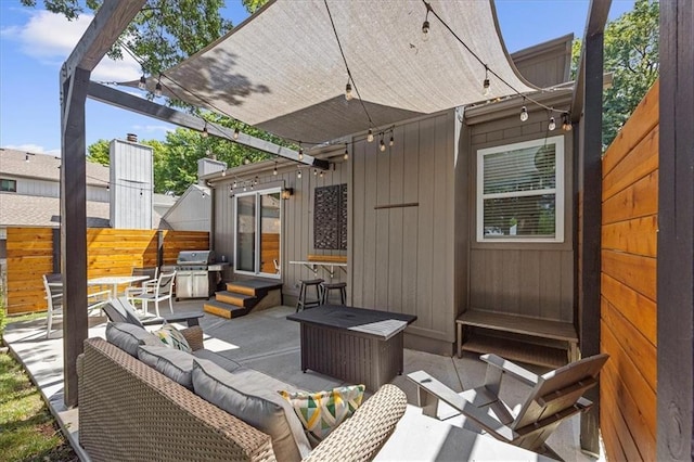 6628 Bradshaw St, Shawnee, KS 66216 - view of patio with entry steps, a grill, and an outdoor hangout area