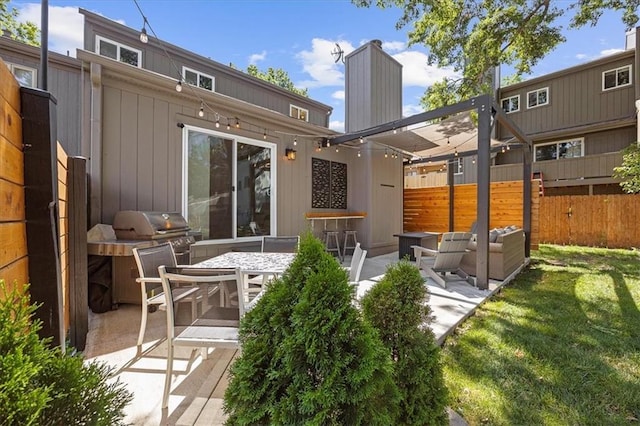 6628 Bradshaw St, Shawnee, KS 66216 - back of house with a patio area, outdoor dining space, and area for grilling