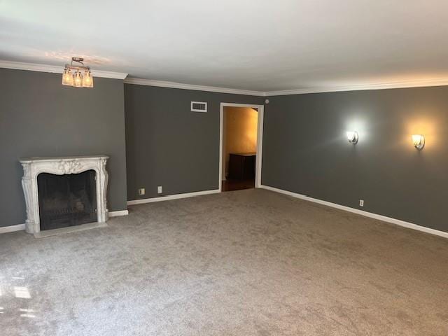1901 NE River Ridge Rd, Saint Joseph, MO 64507 - unfurnished living room featuring crown molding, carpet floors, and a high end fireplace