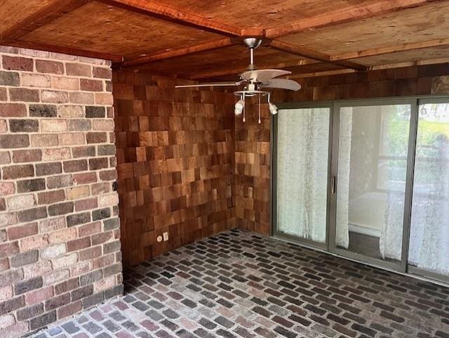 1901 NE River Ridge Rd, Saint Joseph, MO 64507 - unfurnished sunroom featuring beamed ceiling