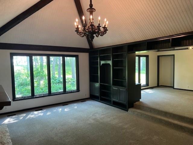 1901 NE River Ridge Rd, Saint Joseph, MO 64507 - spare room with carpet, beamed ceiling, a chandelier, healthy amount of natural light, and high vaulted ceiling