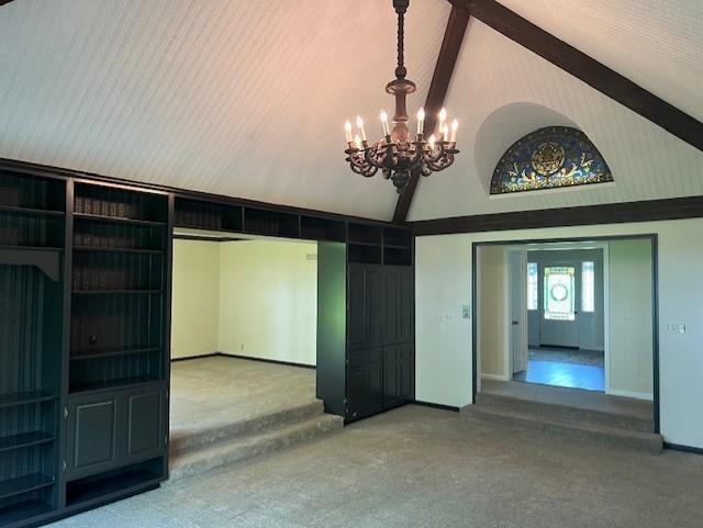 1901 NE River Ridge Rd, Saint Joseph, MO 64507 - spare room featuring a chandelier and carpet floors