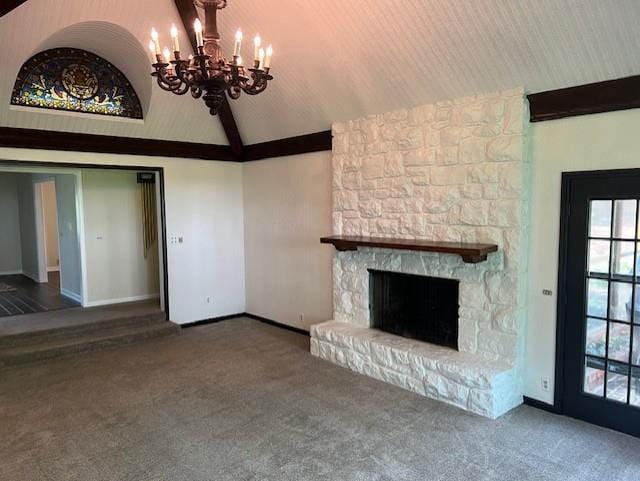 1901 NE River Ridge Rd, Saint Joseph, MO 64507 - unfurnished living room with lofted ceiling, a chandelier, carpet flooring, a fireplace, and plenty of natural light