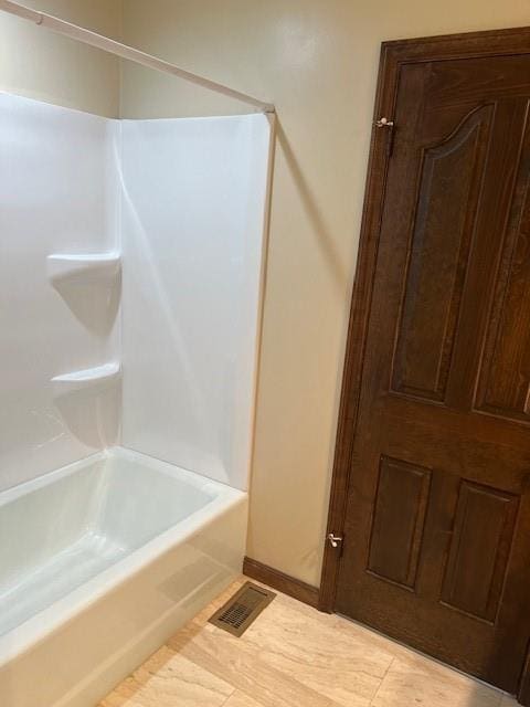 1901 NE River Ridge Rd, Saint Joseph, MO 64507 - bathroom featuring shower / bath combination and tile patterned floors