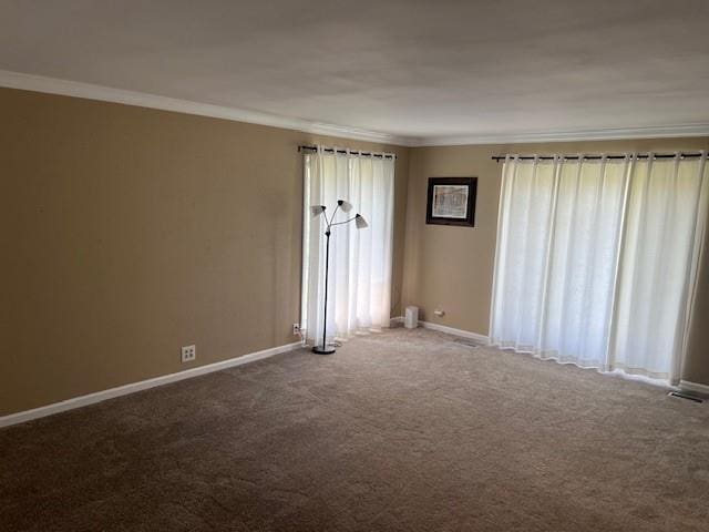 1901 NE River Ridge Rd, Saint Joseph, MO 64507 - unfurnished room with ornamental molding and carpet floors