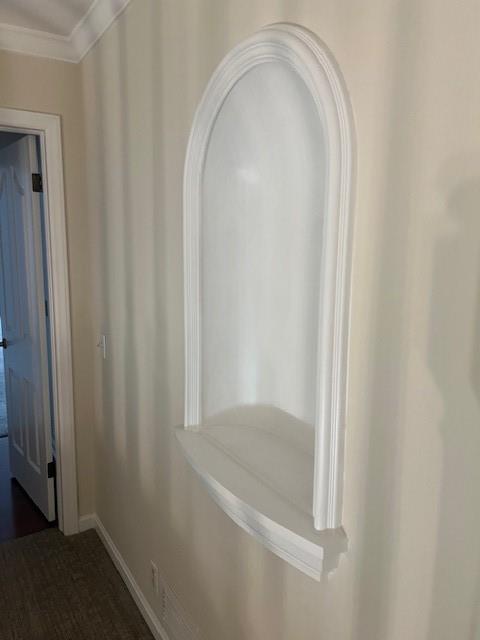 1901 NE River Ridge Rd, Saint Joseph, MO 64507 - hall with crown molding and arched walkways