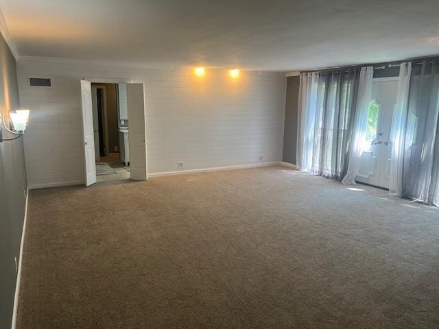 1901 NE River Ridge Rd, Saint Joseph, MO 64507 - unfurnished room featuring carpet and crown molding