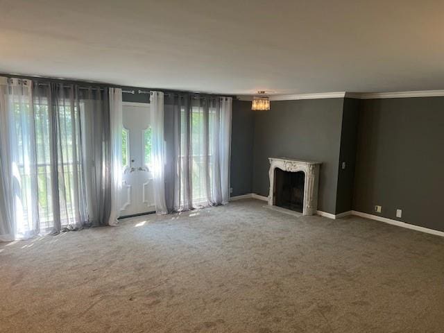 1901 NE River Ridge Rd, Saint Joseph, MO 64507 - unfurnished living room with carpet, ornamental molding, and a fireplace