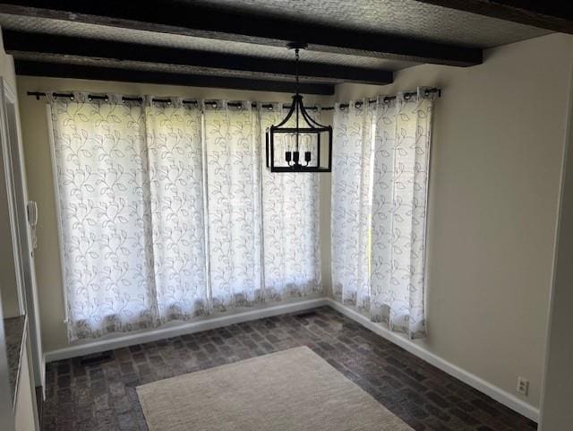 1901 NE River Ridge Rd, Saint Joseph, MO 64507 - unfurnished dining area featuring brick flooring, a chandelier, and beam ceiling