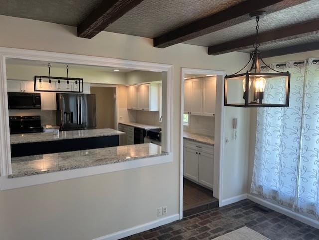 1901 NE River Ridge Rd, Saint Joseph, MO 64507 - kitchen featuring fridge with ice dispenser, black microwave, stove, brick flooring, and beamed ceiling