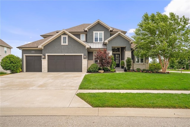 17117 Bluejacket St, Overland Park, KS 66221 - craftsman house with stucco siding, concrete driveway, a garage, and a front yard