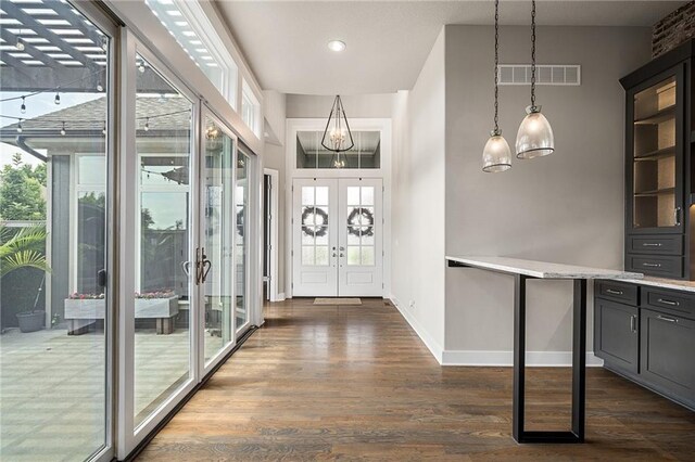 17117 Bluejacket St, Overland Park, KS 66221 - foyer with french doors and dark wood-style floors
