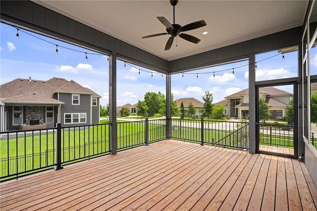 17117 Bluejacket St, Overland Park, KS 66221 - unfurnished sunroom featuring a ceiling fan and a residential view