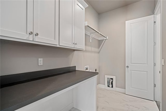 17117 Bluejacket St, Overland Park, KS 66221 - laundry room featuring electric dryer hookup, cabinet space, light marble finish flooring, and hookup for a washing machine