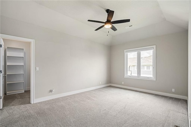 17117 Bluejacket St, Overland Park, KS 66221 - carpeted empty room featuring a ceiling fan and lofted ceiling