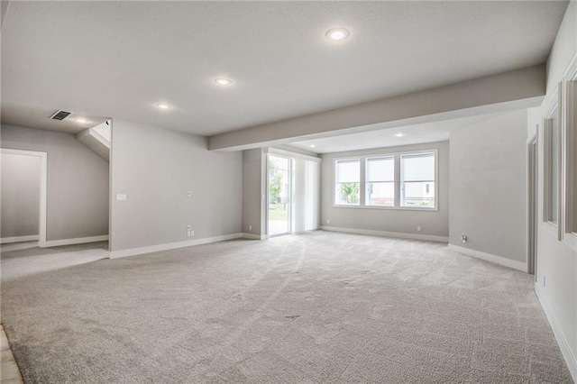 17117 Bluejacket St, Overland Park, KS 66221 - unfurnished living room featuring light carpet and recessed lighting