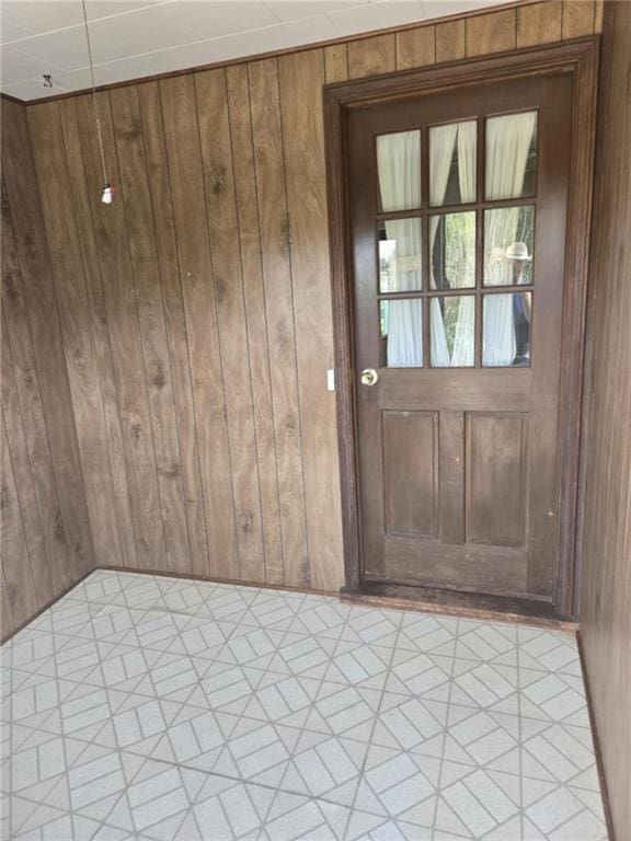 18916 166th St, Basehor, KS 66007 - foyer entrance with wood walls and light floors