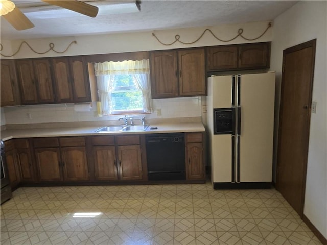 18916 166th St, Basehor, KS 66007 - kitchen featuring white fridge with ice dispenser, dishwasher, light countertops, tasteful backsplash, and light flooring