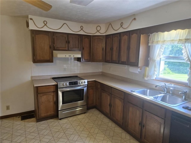 18916 166th St, Basehor, KS 66007 - kitchen with stainless steel range with electric cooktop, extractor fan, dishwasher, light countertops, and tasteful backsplash