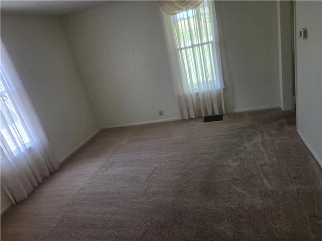 18916 166th St, Basehor, KS 66007 - unfurnished room with light colored carpet and healthy amount of natural light