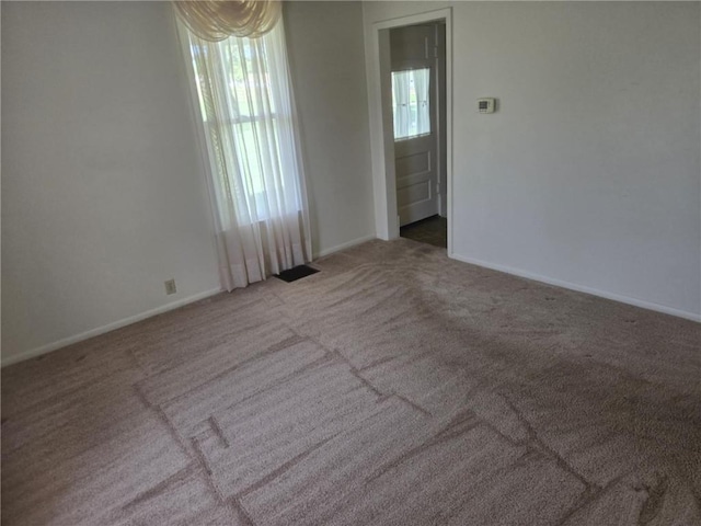 18916 166th St, Basehor, KS 66007 - empty room featuring carpet floors and baseboards