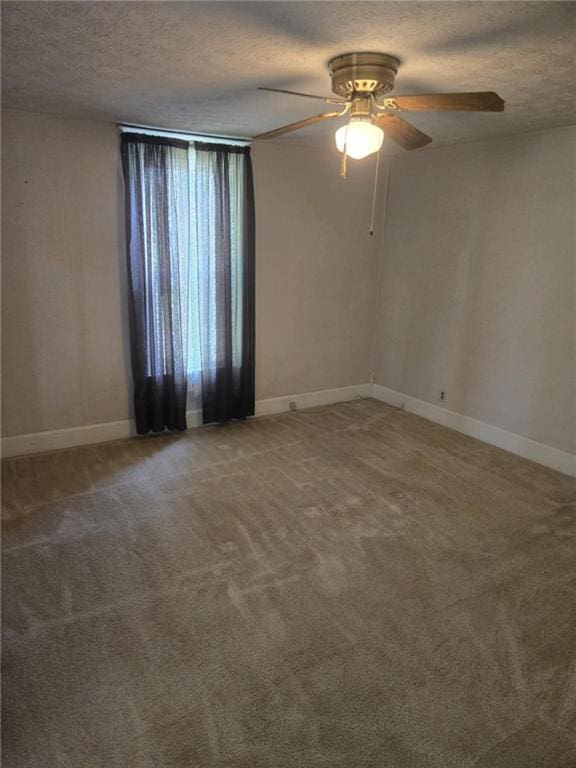 18916 166th St, Basehor, KS 66007 - spare room featuring a textured ceiling, ceiling fan, and carpet