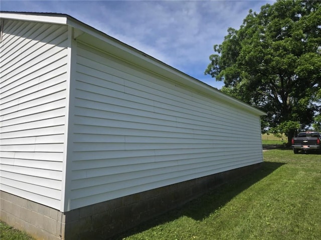 18916 166th St, Basehor, KS 66007 - view of property exterior featuring a yard