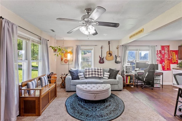 5525 NE Meadowbrook Rd, Kansas City, MO 64119 - living area with an office area, ceiling fan, and wood finished floors