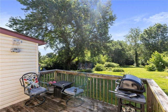 5525 NE Meadowbrook Rd, Kansas City, MO 64119 - deck with a yard and grilling area